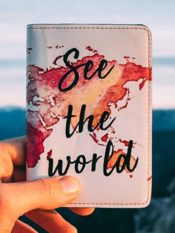 "See the World" custom passport cover (photo: WanderLabs, Unsplash).
