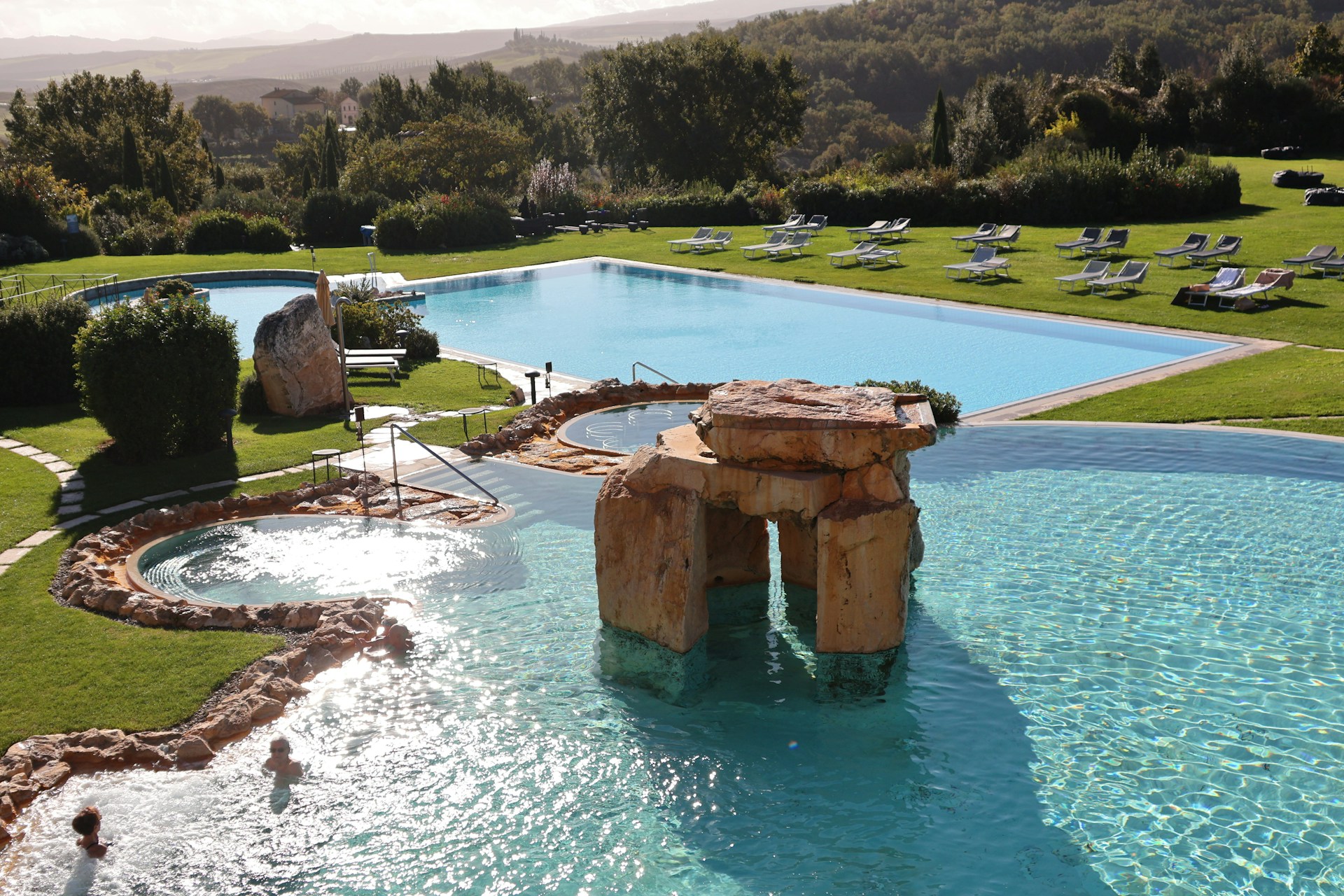 Swimming pools at Adler Spa Resorts Lodges in Tuscany (photo: Meg von Haartman, Unsplash).