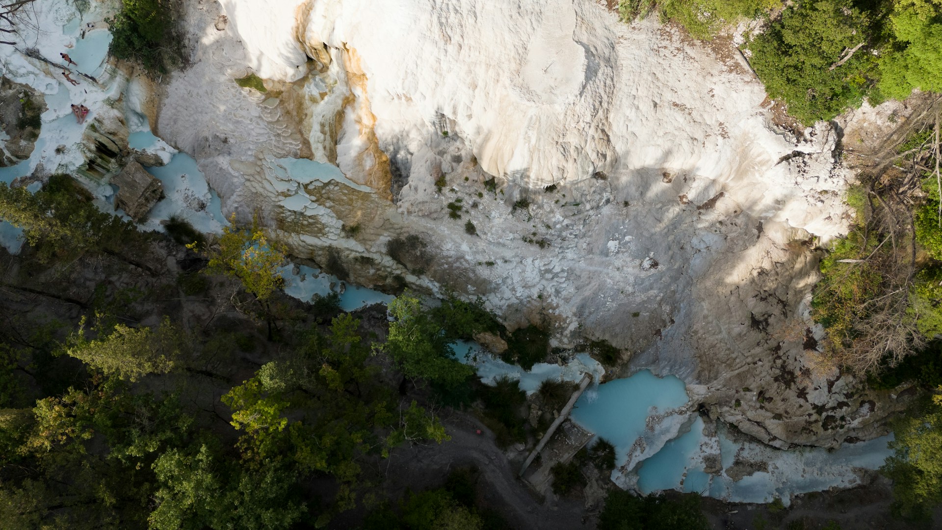 Hot springs at Bagni San Filippo, Italy  (photo: Roby Allario, Unsplash).