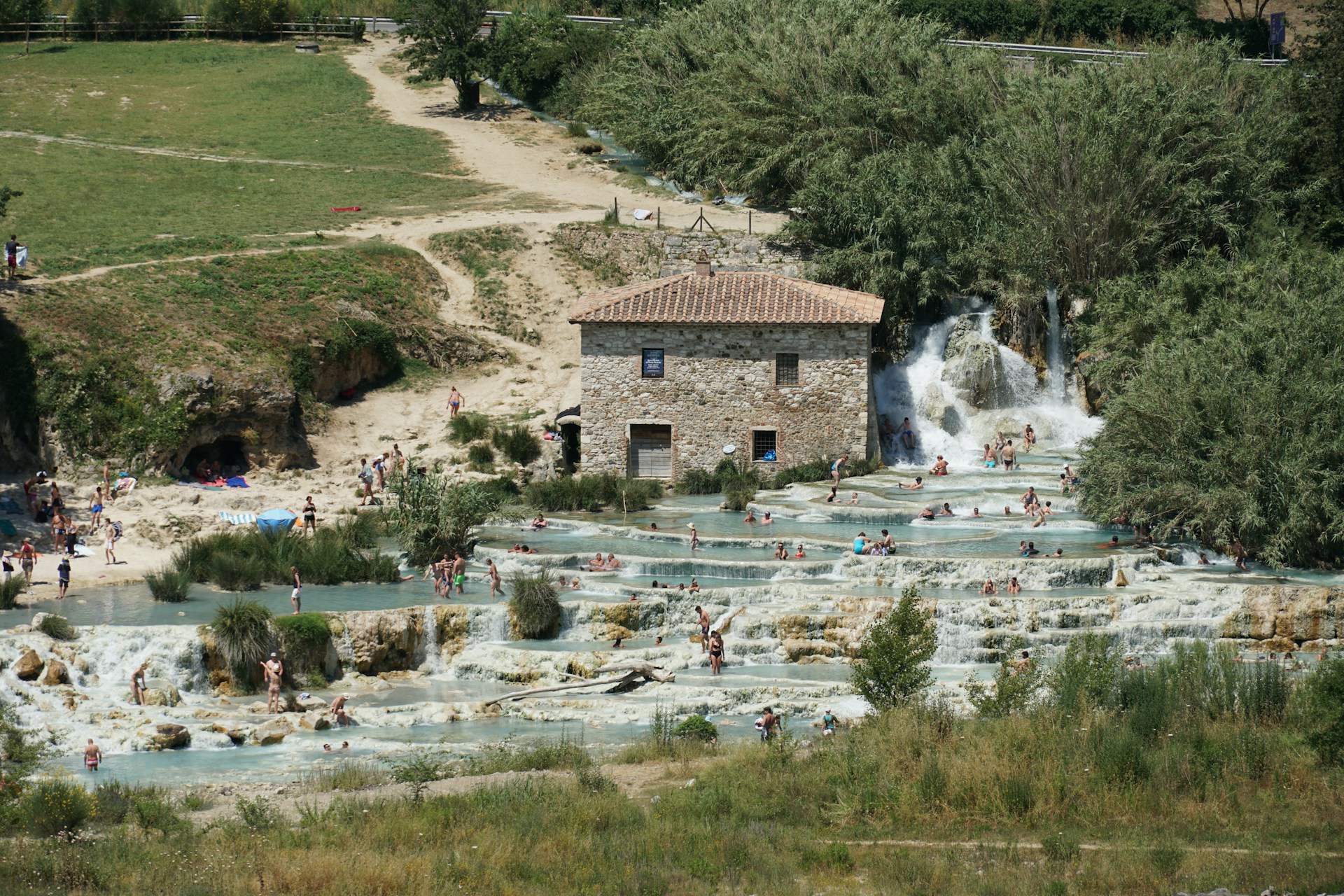 Natural hot springs at Saturnia in Italy  (photo: Sheila C, Unsplash).