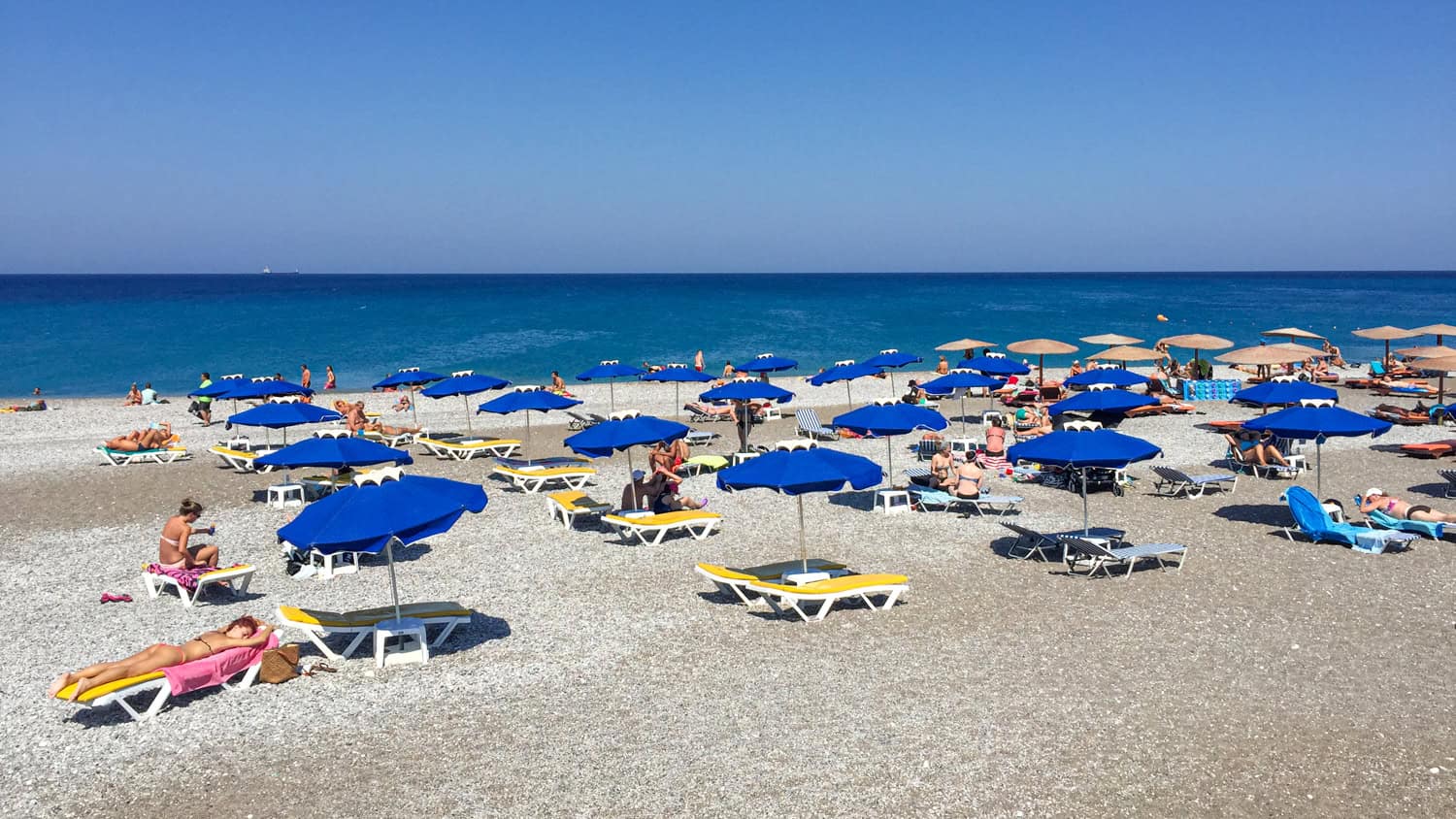 Sunbathers at Elli Beach on Rhodes.