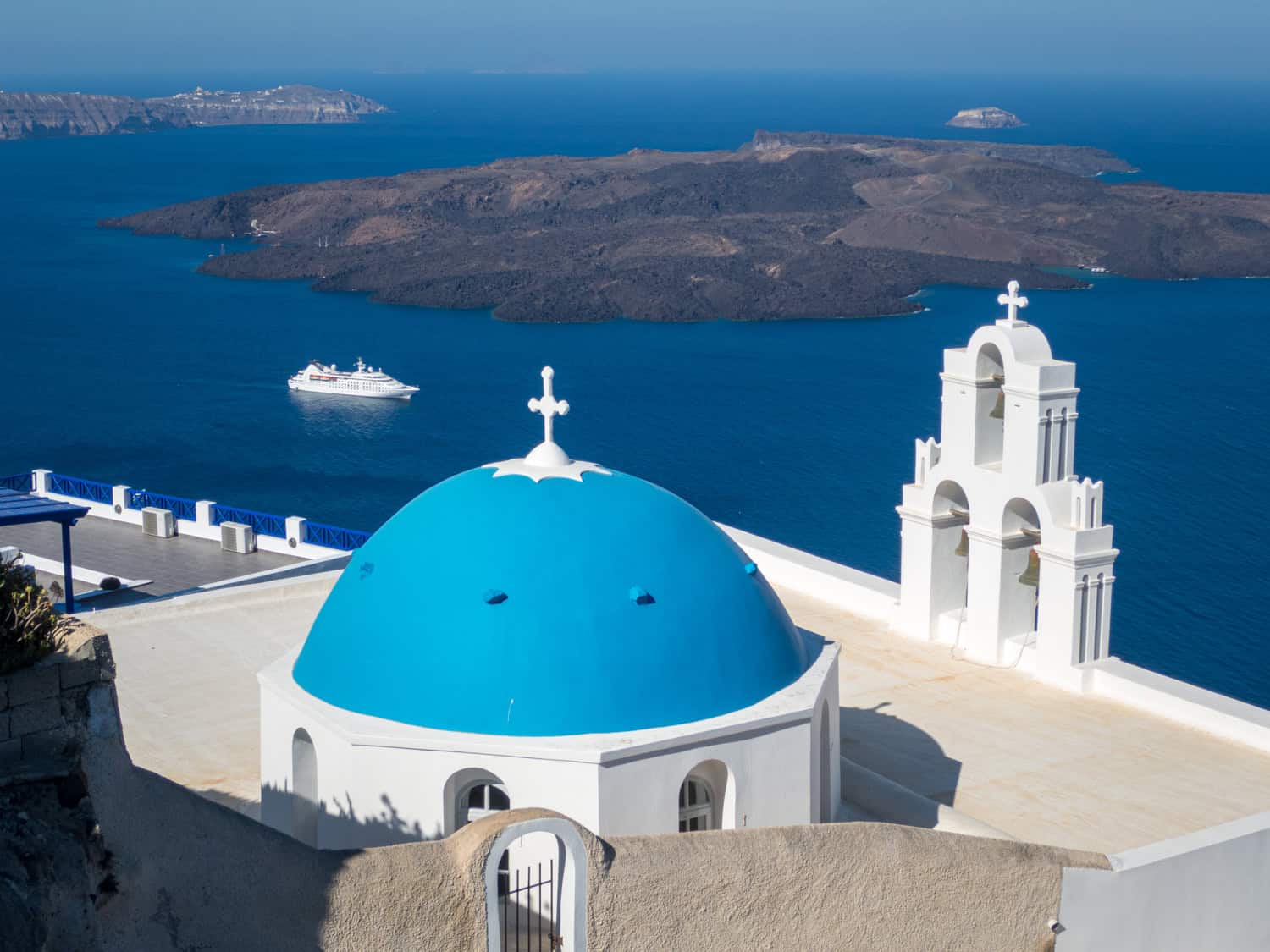 The blue dome of a church on Santorini.