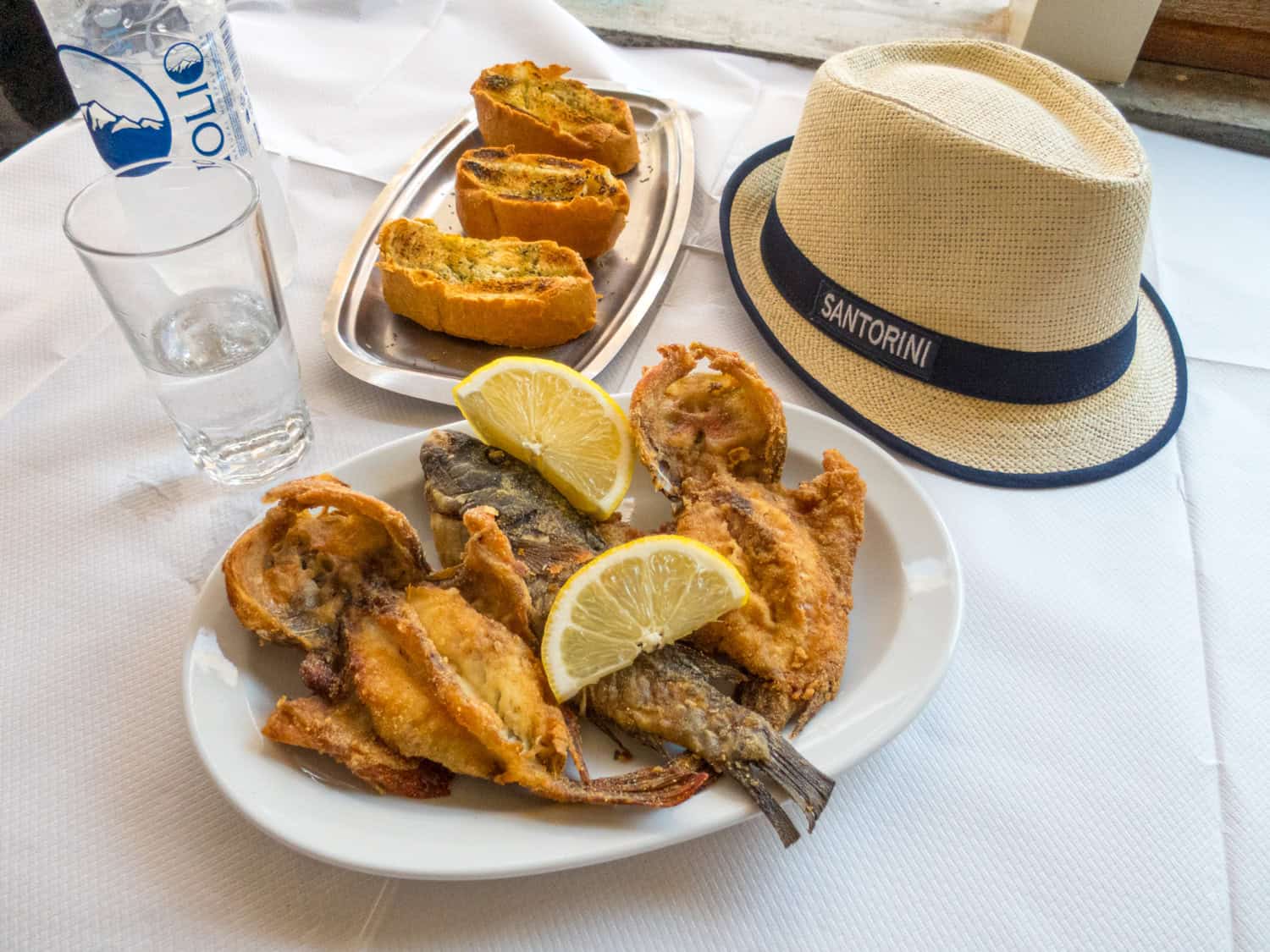 Fried fish at The Dolphins, a seaside tavern near Red Beach.