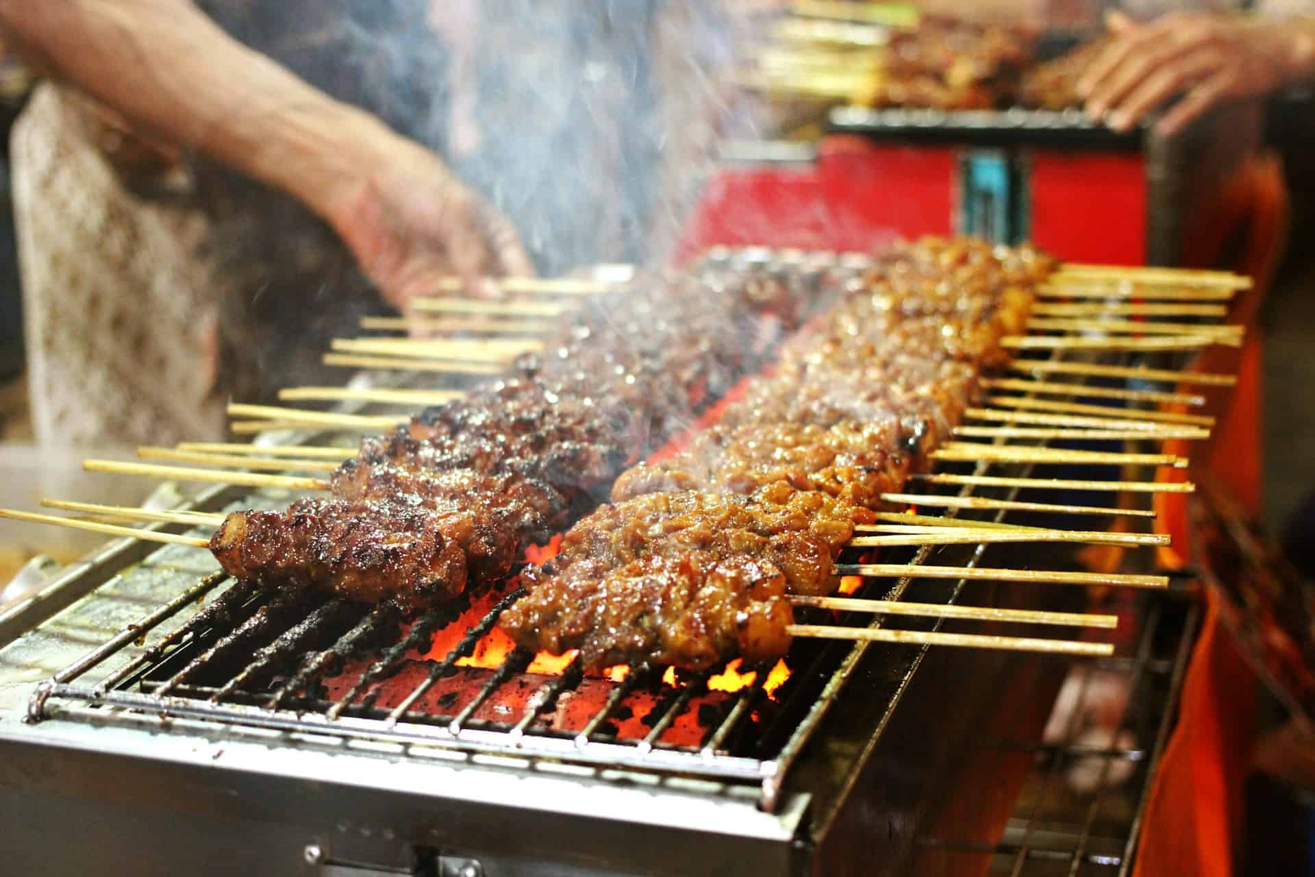 Authentic travel includes eating like a local, such as street food (photo by Nita Anggraeni Goenawan).
