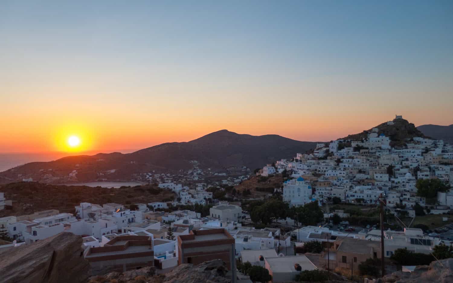 Sunset on Ios as seen from the hilltop Panagia Gremiotissa Church.