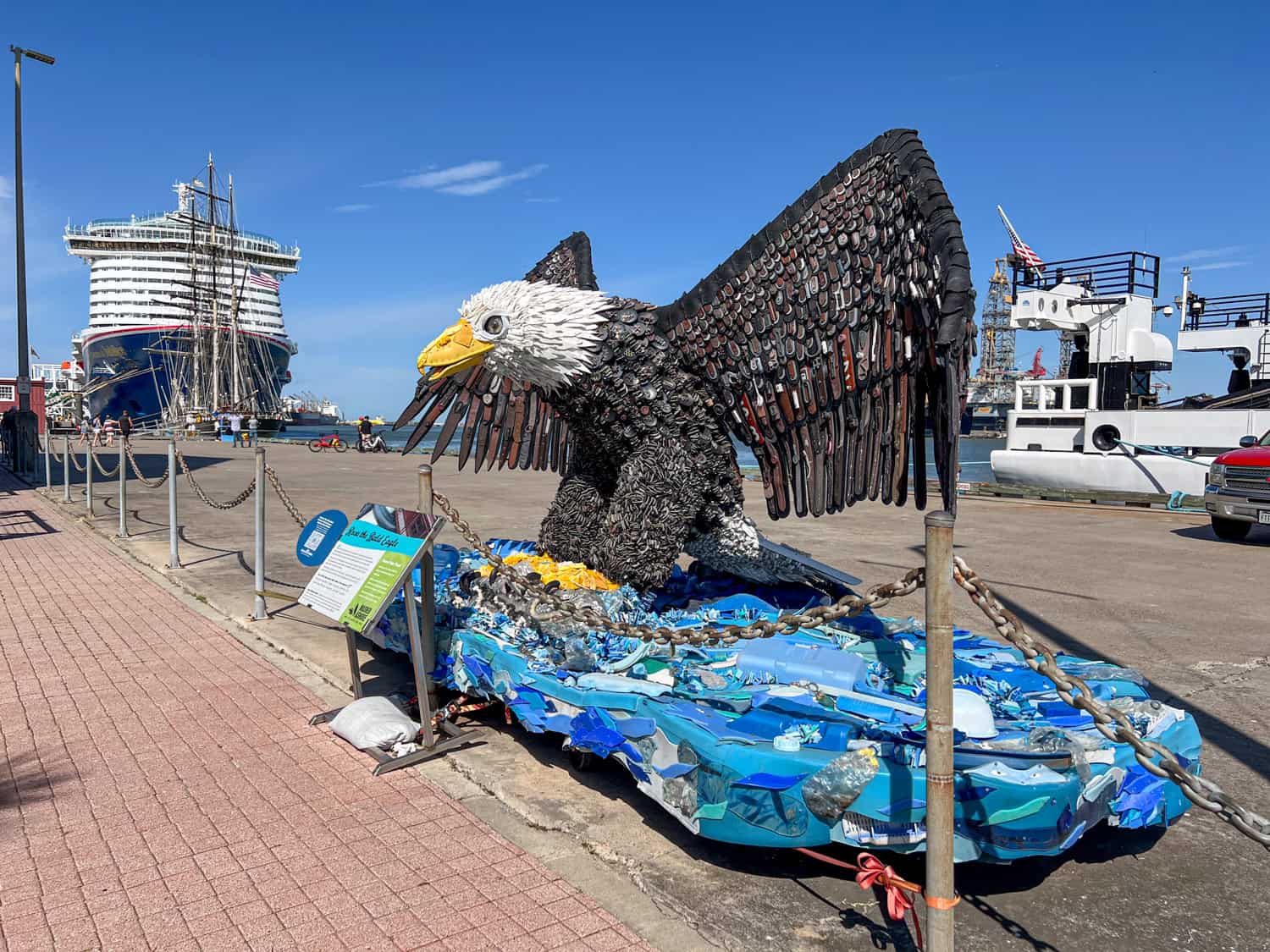 A bald eagle sculpture made of plastic waste from the ocean.