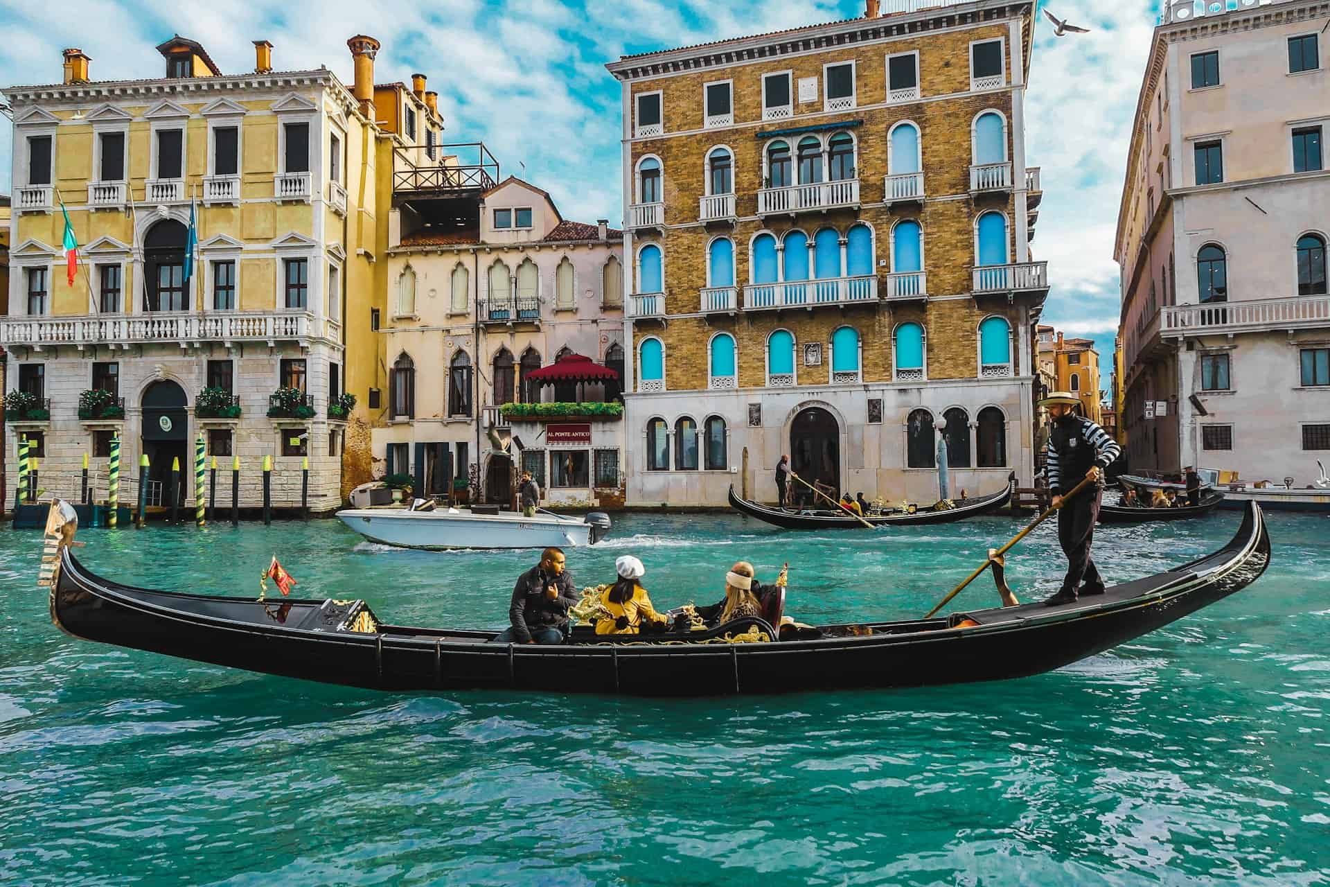 Gondola ride in Venice (photo by Adrian Krajcar, Unsplash).