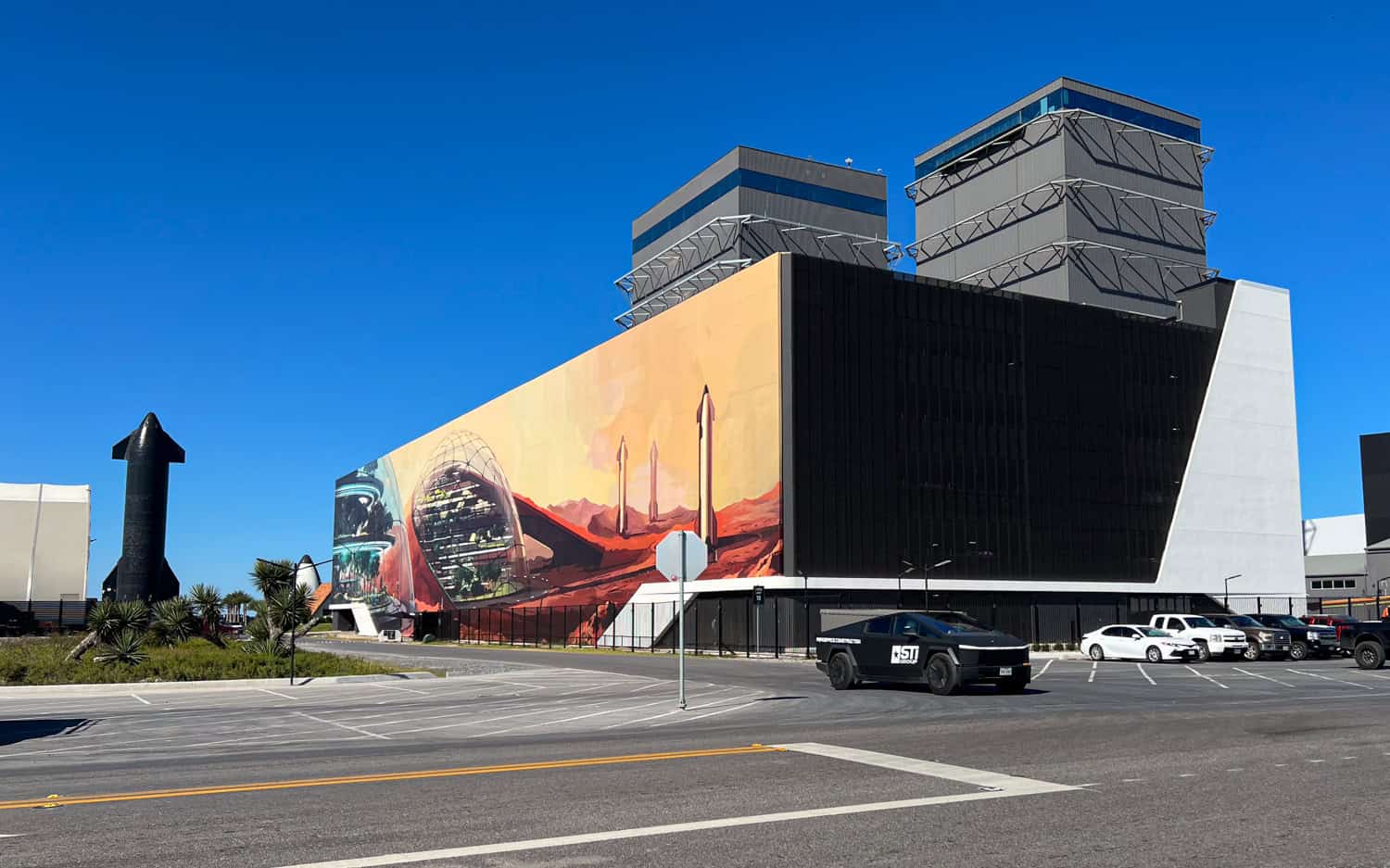 A Mars mural and Starship in the SpaceX Rocket Garden.