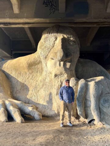 Dave pictured with the Fremont Troll (photo by Kelly Lemons).