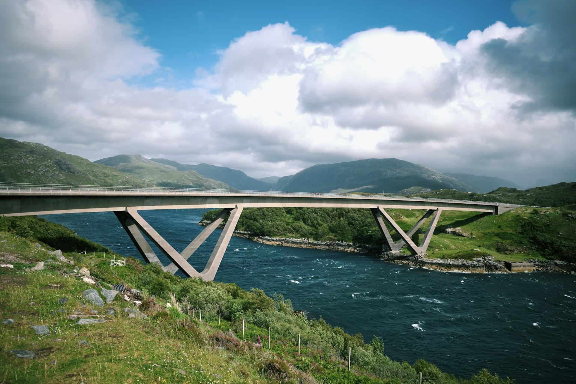 The Kylesku Bridge on the NC500 in Scotland (photo: Simon Wiedensohler, Unsplash).