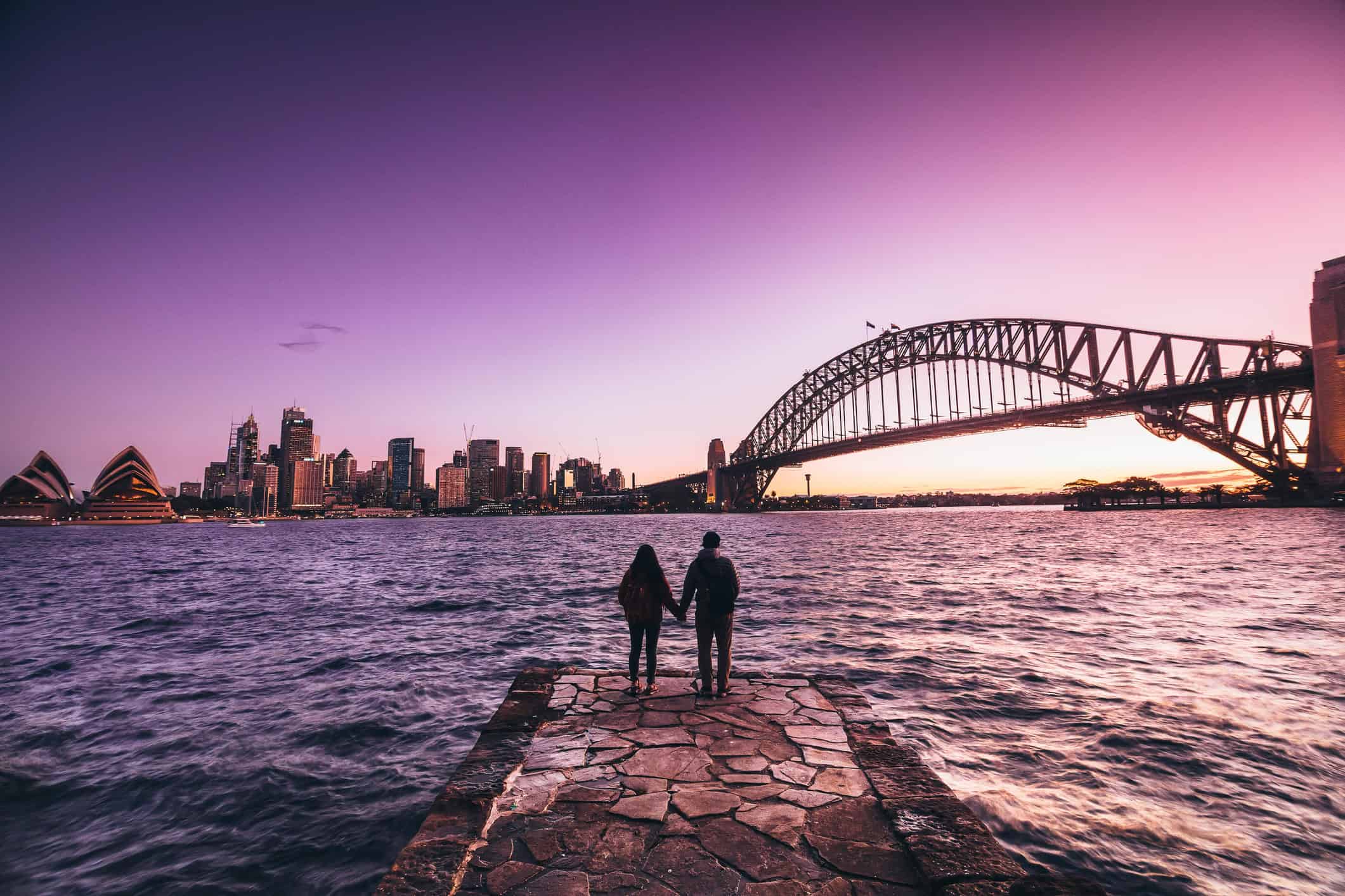 An Australia partner visa can make scenes like this couple at sunset in Sydney a reality (photo: EyeEm Mobile GmbH, iStock).