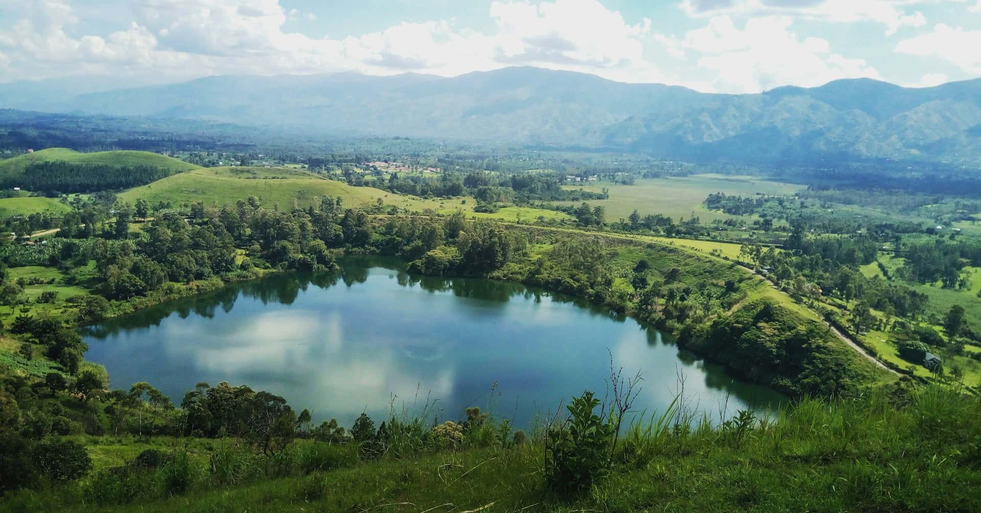A crater lake in Uganda (photo: Keith Kasaija). A crater lake in Uganda (photo: Keith Kasaija).