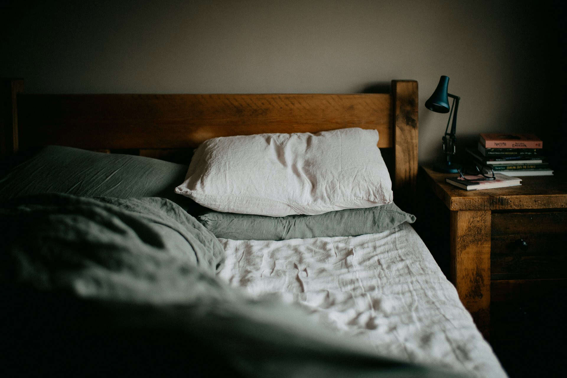 An inviting bed with linen sheets is a welcome part of any post-hike recovery (photo: Annie Spratt).