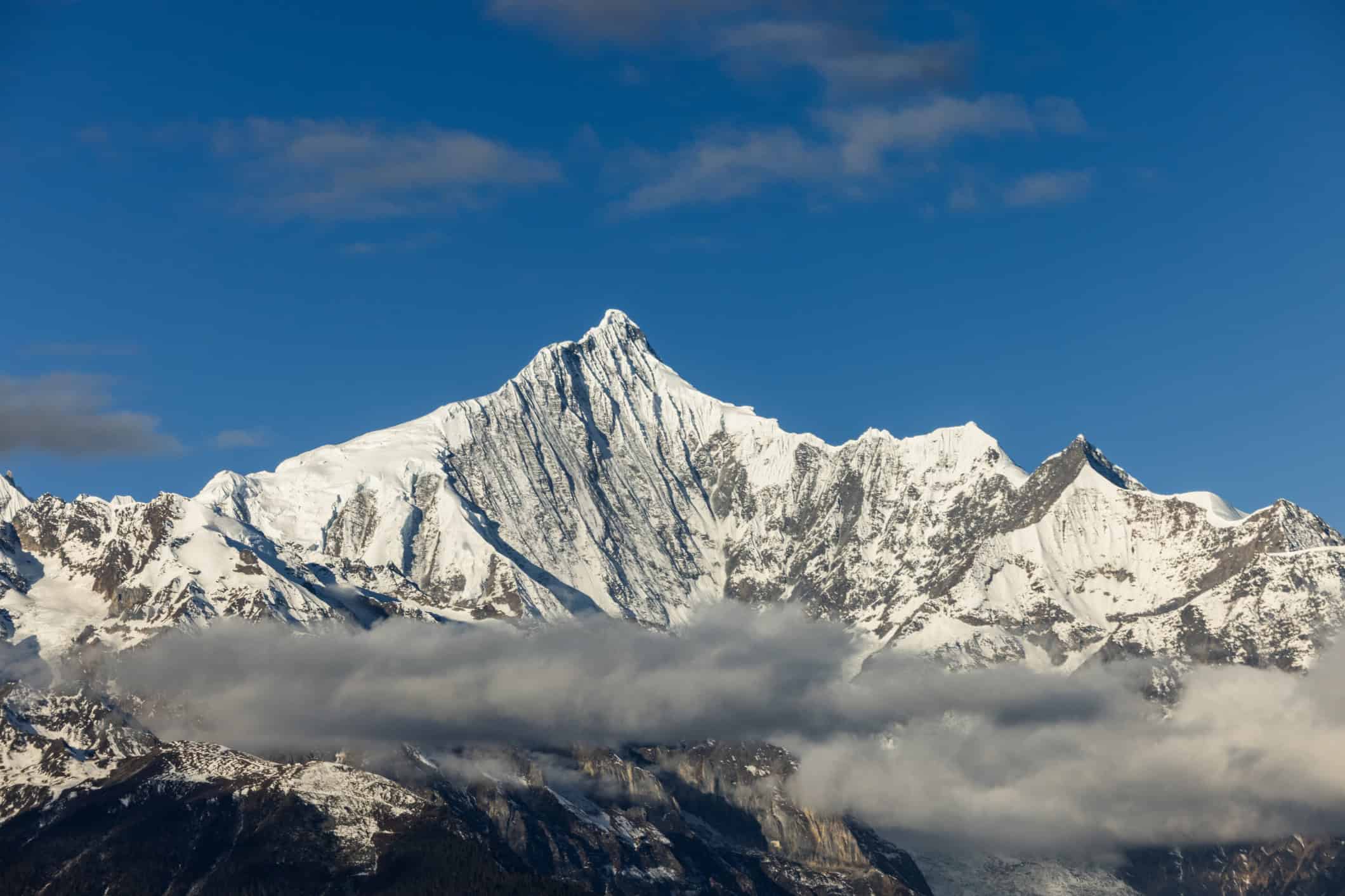 The highest peak at Meili Snow Mountain in Yunnan, China (photo:  ximushushu, iStock).