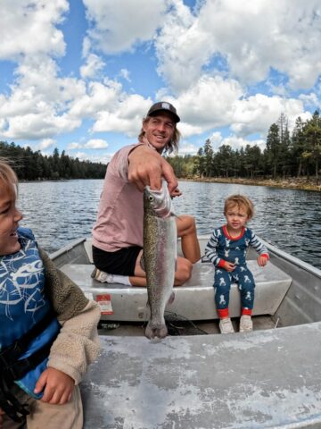 A family fishing together (photo: Derek Owens, Unsplash).