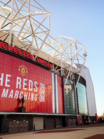 Outside Old Trafford (photo: Nat Callaghan, Unsplash).