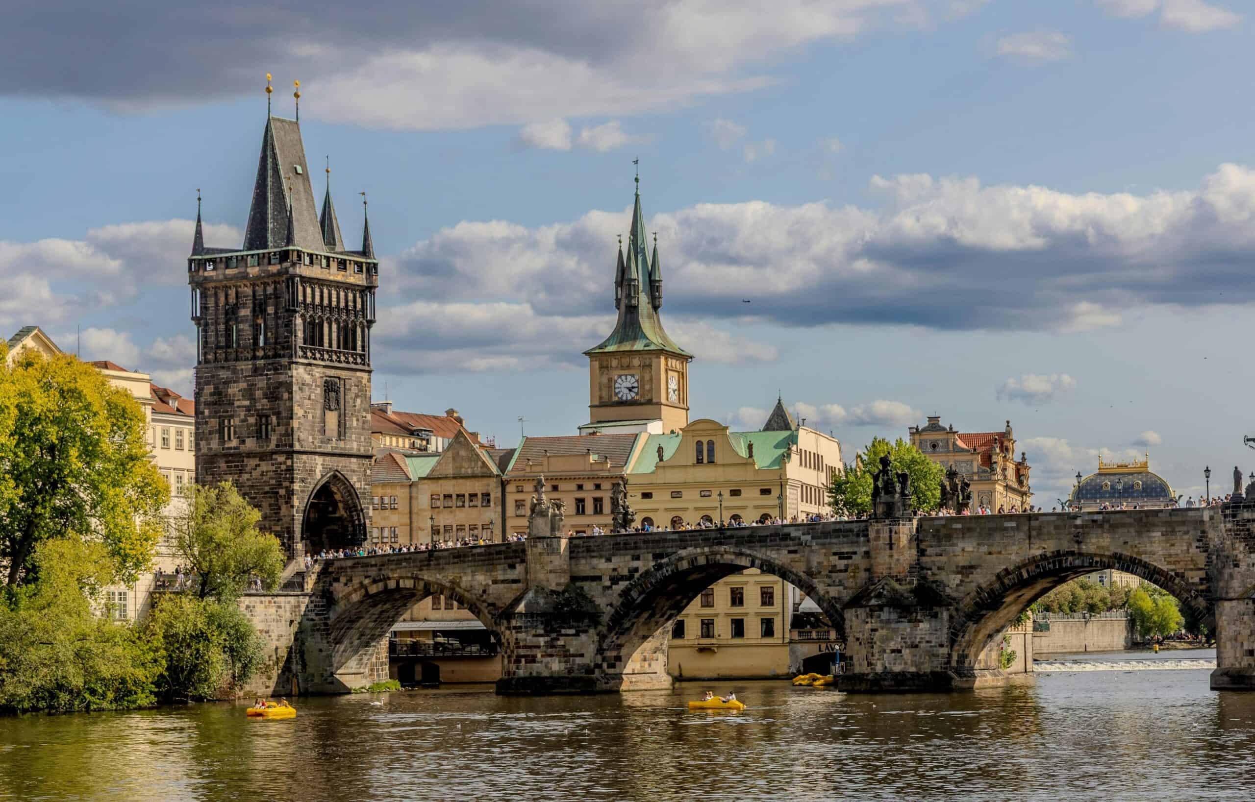Walking across the Charles Bridge is a popular travel experience in Europe (photo: Igor Passchier).