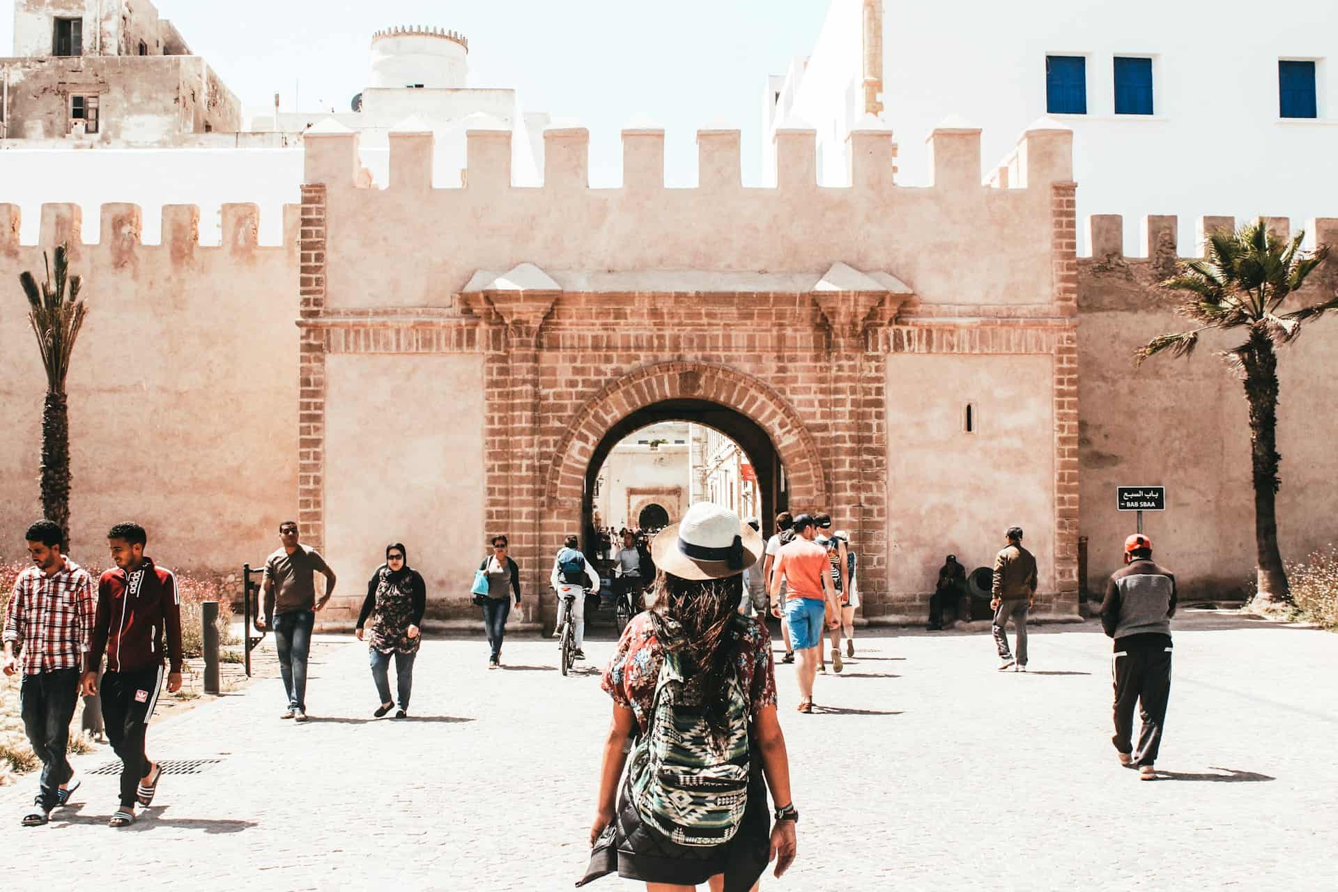 A woman exploring Essaouira, Morocco (photo: Louis Hansel, Unsplash).