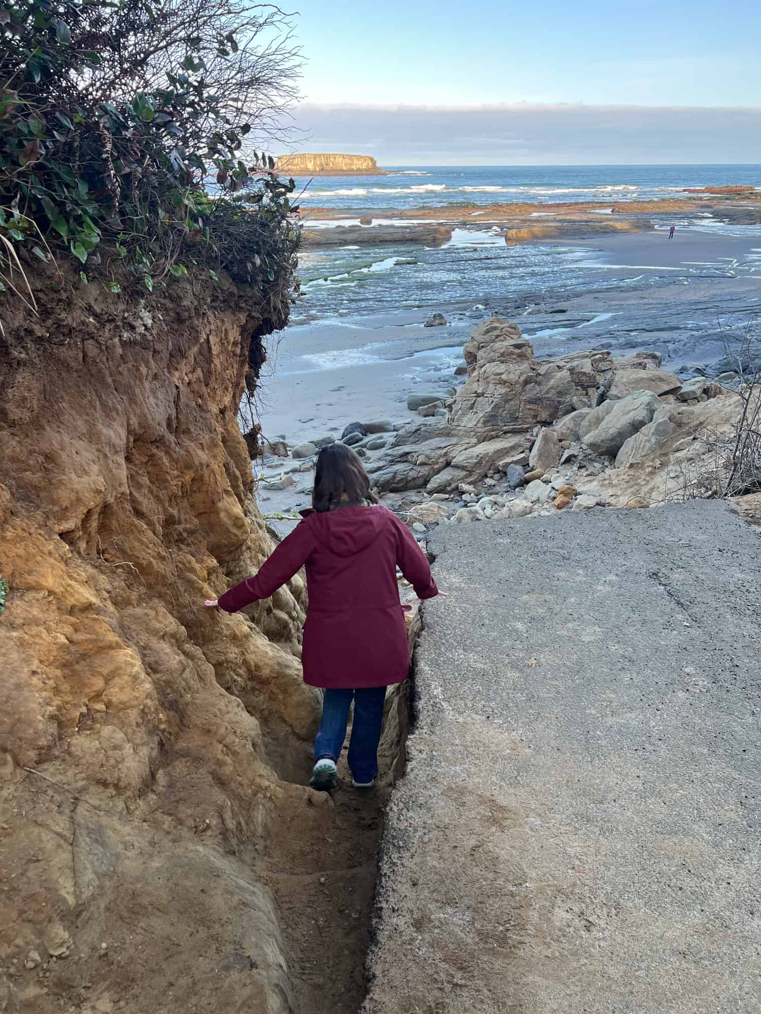 Kel hikes down to Otter Crest Beach where the sidewalk ends.
