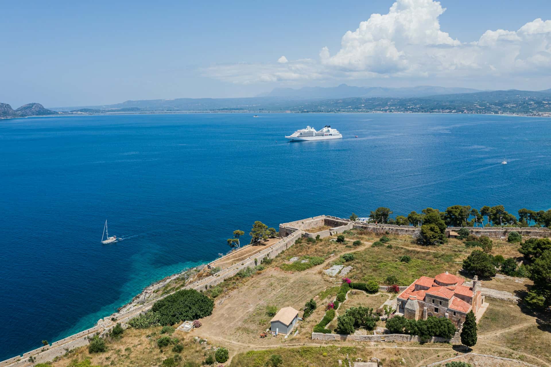 A fly cruise is one way to experience the Greek islands (photo: Shai Pal, Unsplash).
