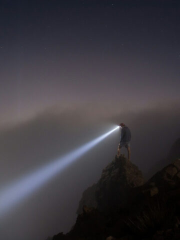 Hiking in fog with a headlamp, a vital small tool (photo: Isaac Davis).