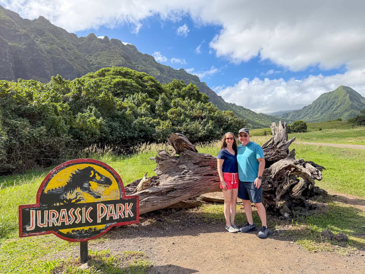 Kel and Dave pose in front of the fallen log from the original Jurassic Park film.