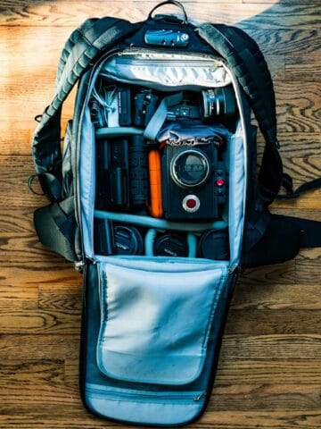Camera bag with gear (photo: Skye Studios, Unsplash).