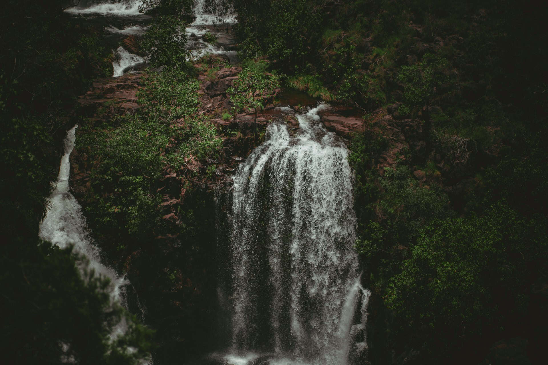A waterfall at Litchfield National Park in Darwin (photo: Lucid, Unsplash).