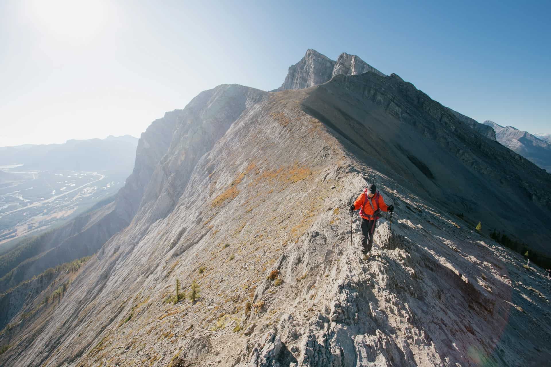 Hiker nearing the summit of Ha Ling Peak in Canmore, Alberta, Canada