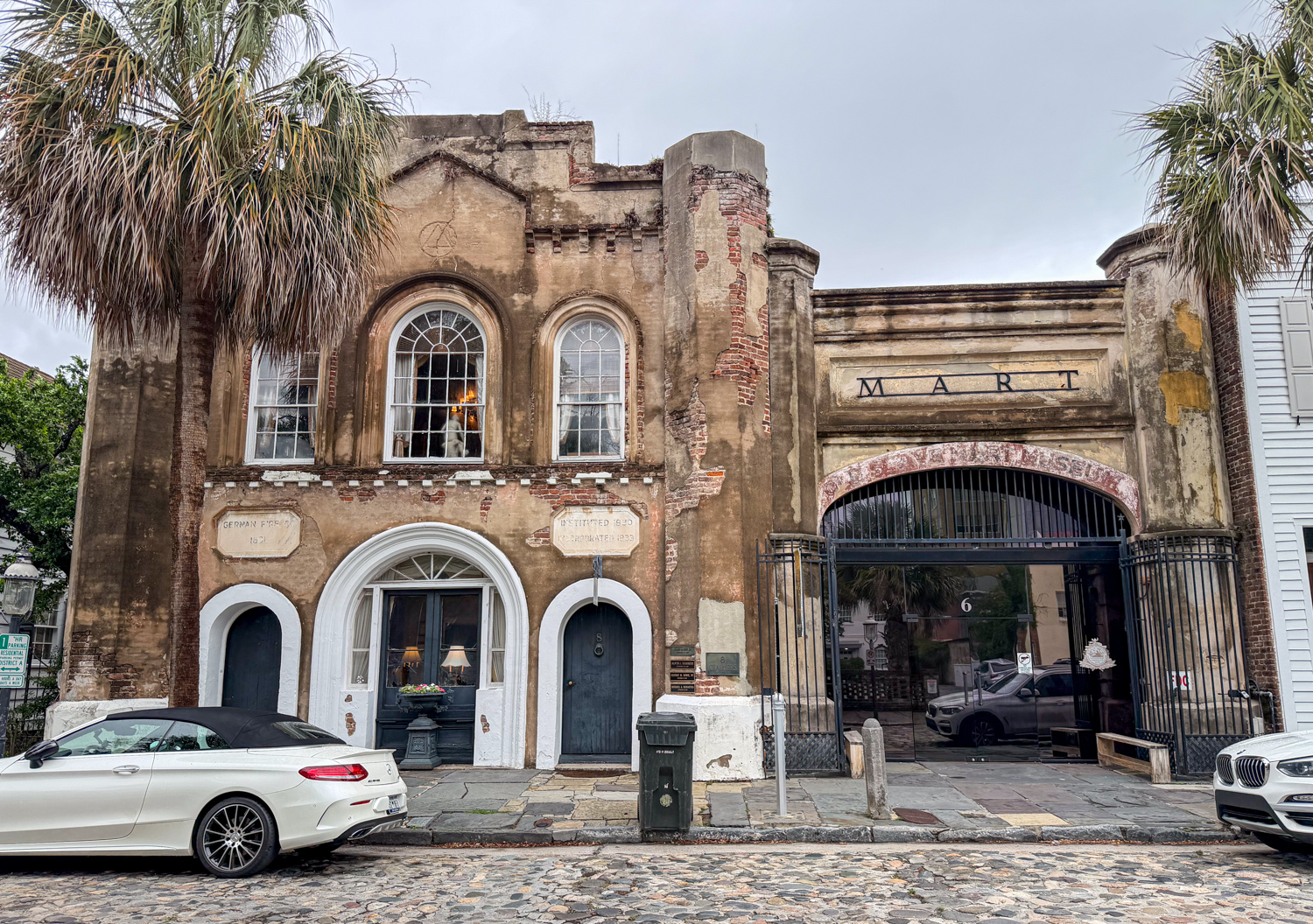 Weathered exterior of the Old Slave Mart Museum on Chalmers Street in Charleston.