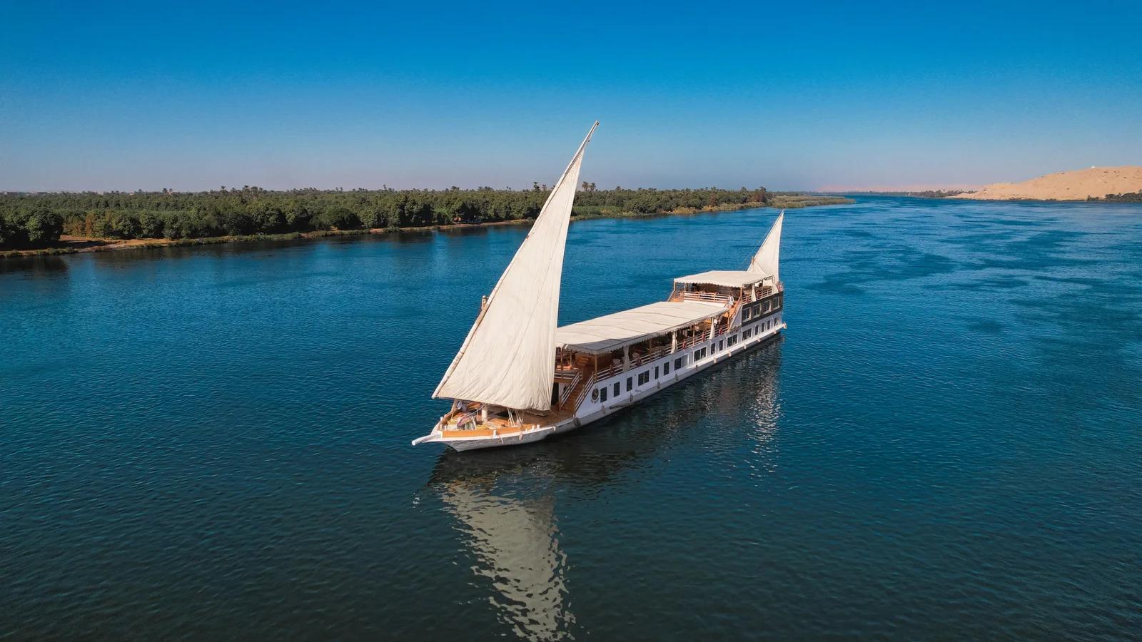Aerial view of Swan Dahabiya sailing on the Nile River