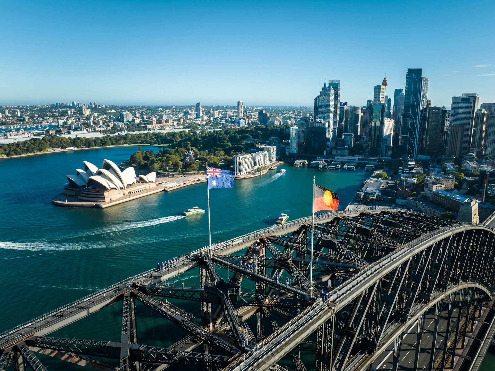 Aerial view of Sydney Opera House and Sydney Harbour Bridge.
